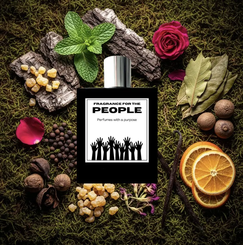 A perfume bottle labelled Fragrance for the People lying on moss among a rose, citrus and spices.